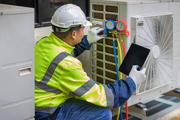 Professional Emergency Ac Repair technician working in Vernon Center, NY